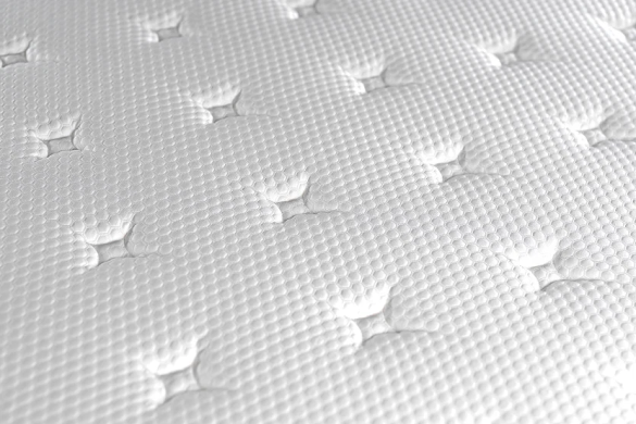 Tufted surface detail of the Elite Slumber mattress